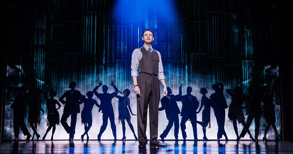 Joshua Grosso (Nick Carraway) and the First National Touring Company of THE GREAT GATSBY. Photo by Evan Zimmerman for MurphyMade.