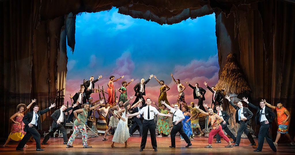 : Sam McLellan and company in THE BOOK OF MORMON North American tour Photo by Julieta Cervantes